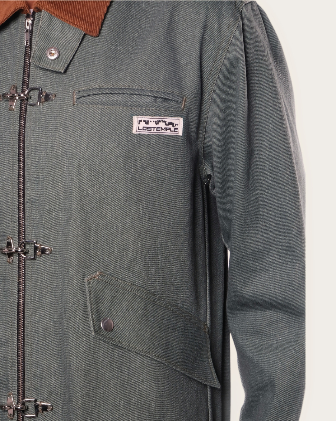 Green jacket with a brand logo on a white background